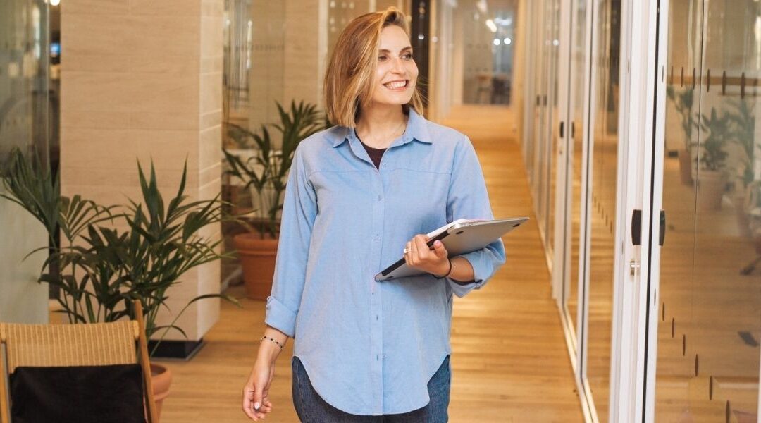 woman walking through office