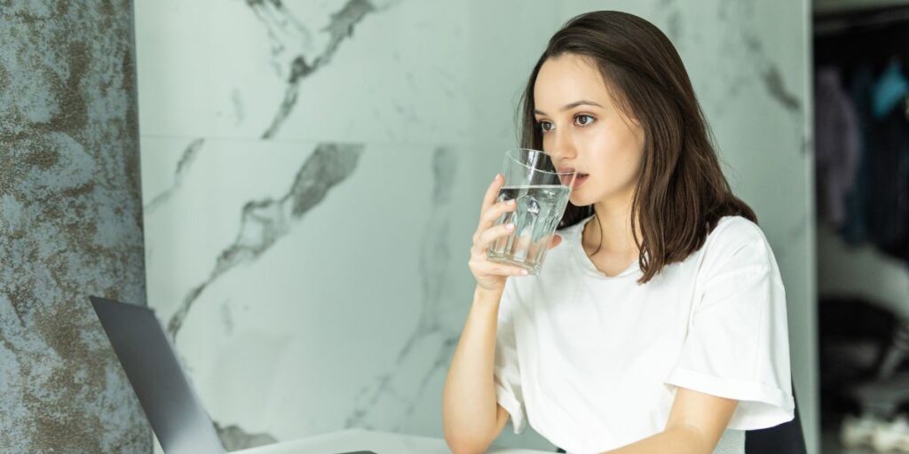 signs of diabetes, increased thirst
woman drinking water