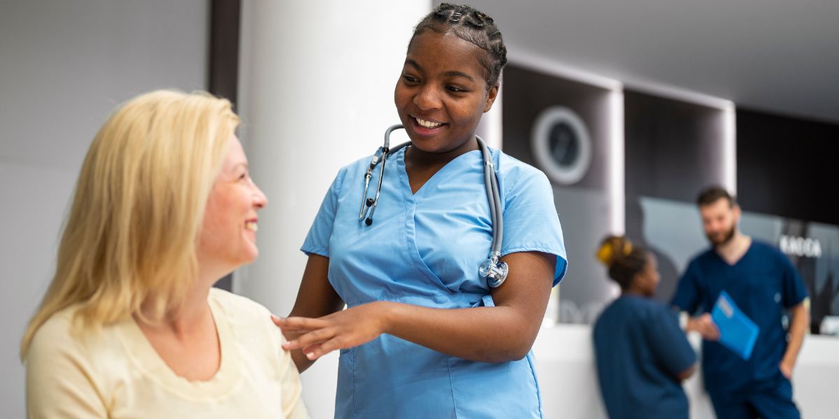 Nurse talking to a patient.