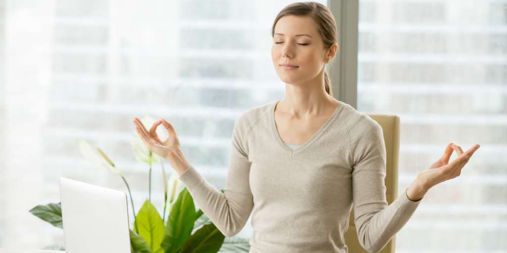 women breathing in and out to manage stress and lower blood pressure