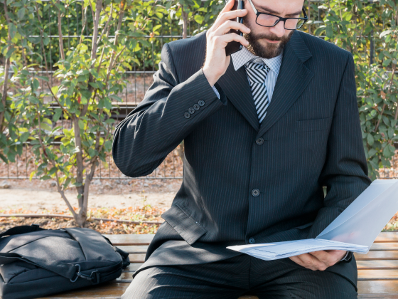 man in suit following up on incident report